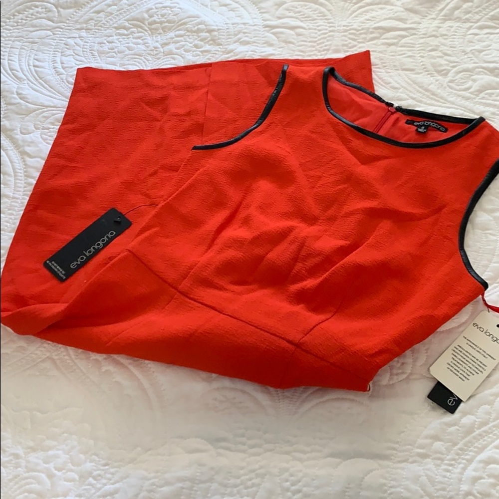 Reddish orange knee length dress